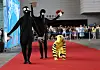 Japanese trio whose costumes are inspired by Korea's folk painting 'Hojakdo' pose for photos on the runway of the ″Dress Like a Museum Exhibit″ ceremony, held at the National Museum of Korea in Yongsan District, central Seoul, on Sept. 27. [YONHAP]