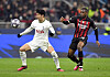 Tottenham Hotspur's Son Heung-min in action against AC Milan's Pierre Kalulu during a UEFA Champions League round of 16 match at San Siro in Milan on Tuesday.  [REUTERS/YONHAP]
