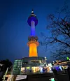 N Seoul Tower on Mount Namsan is lit in the colors of the Ukrainian flag in Seoul. [SEOUL METROPOLITAN GOVERNMENT]