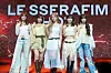 Girl group Le Sserafim poses for photos during a showcase held on March 14 at Yes24 Live Hall in eastern Seoul for the release of the fifth EP “Hot.” [DANIELA GONZALEZ PEREZ]