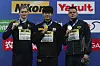 Hwang Sun-woo with gold, center, Aleksandr Sjcjegolev of Russia with silver, left, and Danas Rapsys of Lithuania with bronze stand on the podium after the 200-meter freestyle during the World Swimming Championships in Abu Dhabi, United Arab Emirates, on Friday. [AP/YONHAP]