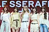 Girl group Le Sserafim poses for photos during a showcase held on March 14 at Yes24 Live Hall in eastern Seoul for the release of its fifth EP “Hot.” [DANIELA GONZALEZ PEREZ]