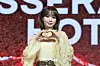 Le Sserafim's Kim Chae-won poses for photos during a showcase held on March 14 at Yes24 Live Hall in eastern Seoul for the release of its fifth EP “Hot.” [DANIELA GONZALEZ PEREZ]