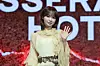 Le Sserafim's Kim Chae-won poses for photos during a showcase held on March 14 at Yes24 Live Hall in eastern Seoul for the release of its fifth EP “Hot.” [DANIELA GONZALEZ PEREZ]