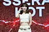 Le Sserafim's Sakura poses for photos during a showcase held on March 14 at Yes24 Live Hall in eastern Seoul for the release of its fifth EP “Hot.” [DANIELA GONZALEZ PEREZ]