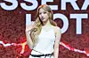 Le Sserafim's Kazuha poses for photos during a showcase held on March 14 at Yes24 Live Hall in eastern Seoul for the release of its fifth EP “Hot.” [DANIELA GONZALEZ PEREZ]