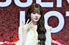 Le Sserafim's Hong Eun-chae poses for photos during a showcase held on March 14 at Yes24 Live Hall in eastern Seoul for the release of its fifth EP “Hot.” [DANIELA GONZALEZ PEREZ]