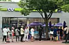 Customers line up for an event held at a CU convenience store in June 2023. [YONHAP]