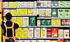 An employee displays Maxim instant coffee mixes in a discount mart in Seoul. [YONHAP]