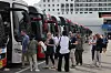 Passengers from the Celebrity Millennium cruise ship board buses to visit tourist spots in Busan on May 22. [SONG BONG-GEUN]