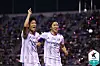 Jun Amano of Ulsan Hyundai, right, celebrates with Lee Chung-yong after scoring Ulsan's winning goal against Suwon FC on Saturday at Suwon Stadium in Suwon, Gyeonggi. [YONHAP]