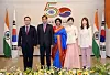 From left, Choi Young-sam, deputy minister of political affairs of the Foreign Ministry; Amit Kumar, ambassador of India to Korea; his wife Surabhi Kumar; Yim Kyung-sook, chairperson of the Korea Food Promotion Institute; and Kang Yun-jin, director general for international cooperation at the Ministry of Patriots and Veterans Affairs, unveil the logo for the 50th anniversary of relations between India and Korea approaching next year, at the Swami Vivekananda Cultural Centre of the Indian Embassy in Seoul on Friday. [EMBASSY OF INDIA IN KOREA]
