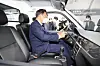 President Moon Jae-in rides an Danigo EV truck using Korean batteries during an event held at LG Energy Solution production plant in South Chungcheong on Thursday. [YONHAP]