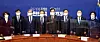 Democratic Party leader Lee Nak-yon, fourth from right, posing with government officials including Prime Minister Chung Sye-kyun, fourth from left, during a meeting between the ruling party and the government at the National Assembly on Sunday. [YONHAP]