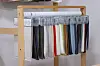 A rack of the various colors of Haunji, or artificial leather made from hanji, a type of Korean traditional paper that is made from the branches of mulberry trees [HANWON MULSAN CORPORATION]