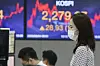 A screen shows the closing figure for the Kospi at a trading room at Hana Bank in Jung District, central Seoul, on Tuesday. The main bourse hit its highest mark since October 2018 thanks to growing expectations of economic recovery. [YONHAP]