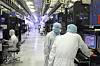 Engineers at SK hynix work at a chip manufacturing line in Korea. [SK hynix]