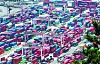Containers are stacked at the Sinseondae container terminal in the southern port city of Busan on July 1. Korea's exports went down on year due to the pandemic, but the reduction rate has declined on month in June. [YONHAP]