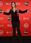 In this handout image courtesy of ABC singer 24KGoldn arrives for the 2020 American Music Awards at the Microsoft theater on Nov. 22, 2020 in Los Angeles. [ABC/YONHAP]