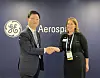 This photo taken on April 10, 2024, local time, and provided by HD Hyundai Heavy Industries Co. shows Joo Won-ho, left, HD Hyundai Heavy's head of the naval special ship business unit, shaking hands with Rita Flaherty, vice president in charge of global sales and business development at GE, after signing an MOU for partnership in naval vessel development and exports during Sea Air Space 2024, a global maritime exposition, held in Washington, D.C., from April 8-10. [YONHAP]