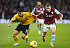 Wolverhampton Wanderers' Hwang Hee-chan in action with Aston Villa's Lucas Digne at Villa Park in Birmingham, England on Jan. 4.  [REUTERS/YONHAP]