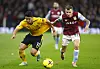 Wolverhampton Wanderers' Hwang Hee-chan in action with Aston Villa's Lucas Digne at Villa Park in Birmingham, England on Jan. 4. [REUTERS/YONHAP]