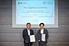 Head of GS Caltex's R&D Center Kwon Young-woon, left, and Summit Cosmetics President and CEO Koh Akiyama pose for a photo after signing a memorandum of understanding to cooperate on 2,3-Butanediol sales at the Japanese firm's headquarters in Tokyo on Wednesday. [GS CALTEX]
