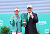 Kim Jae-hee, left, poses with the Hana Financial Group Singapore Women’s Open trophy alongside Hana Financial Group Vice Chairman Lee Eun-hyung after winning the tournament at the Tanah Merah Country Club in Singapore on Sunday. [KLPGA]