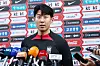 Son Heung-min speaks to reporters following his arrival at the Paju National Football Center in Paju, Gyeonggi on Tuesday. [YONHAP]