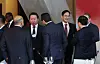 Samsung Electronics Executive Chairman Lee Jae-yong, right, and SK Chairman Chey Tae-won, left, chat with global business leaders at the Global Business Leadership Luncheon in Davos, Switzerland Wednesday. [JOINT PRESS CORPS]