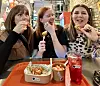 Local residents enjoy Korean food at the Bibigo pop-up store in Shoreditch, London. [CJ CHEILJEDANG]