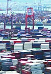 Containers are stacked up at a port in Busan on Aug. 1. [NEWS1]