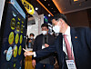 Financial Services Commission Chairman Eun Sung-soo tests some of the technology of KakaoPay displayed during Korea Fintech Week, an FSC exhibition, held in Yeouido last month. [YONHAP]
