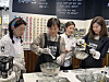 Minister of Agriculture, Food and Rural Affairs Song Mi-ryung, second from the left, and Lush Korea CEO Woo Mi-ryeong, far right, make the 'Mask of Magnaminty' Power Mask with domestically sourced red bean at Lush Korea's Gangnam branch in southern Seoul on Monday. [SEO JI-EUN]