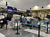 Passengers check in luggage for Air Koryo, North Korea's state-owned airline, at the check-in counter at Beijing Capital International Airport on Tuesday. [YONHAP]