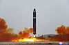 A photo released by the official North Korean Central News Agency (KCNA) shows the launching of a Hwasong-15 intercontinental ballistic missile (ICBM) at Pyongyang International Airport in North Korea on Saturday. [EPA/YONHAP]