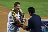 Lee Dae-ho, left, is congratulated by former Samsung Lions star Lee Seung-yuop for his retirement at the 2022 All-Star game held on Saturday at Jamsil Baseball Stadium in southern Seoul. [YONHAP]