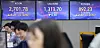 Screens in Hana Bank's trading room in central Seoul show the stock market price as it opens on Thursday. [YONHAP]