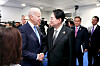 President Yoon Suk-yeol, right, shakes hands with U.S. President Joe Biden ahead of a trilateral summit with Japanese Prime Minister Fumio Kishida on the sidelines of a NATO gathering at the IFEMA Convention Center in Madrid Wednesday afternoon. [JOINT PRESS CORPS]
