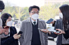 Kim Jin-wook, head of the Corruption Investigation Office for High-ranking Officials, answers reporters' questions on Thursday. [NEWS1]