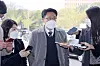 Kim Jin-wook, head of the Corruption Investigation Office for High-ranking Officials, answers reporters' questions on Thursday. [NEWS1]