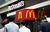 People walk by a McDonald’s Korea branch in Seoul. [YONHAP]