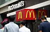 People walk by a McDonald’s Korea branch in Seoul. [YONHAP]