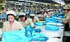 North Korean workers are seen on the factory floor at the Kaesong Industrial Complex in this file photo from September 2013. [YONHAP]