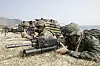 In this March 30, 2015, file photo, marines of Korea, right, and the U.S aim their weapons near amphibious assault vehicles during Korea-U.S. joint landing military exercises as part of the annual joint military exercise Foal Eagle between the two countries in Pohang. Since 2018, the two countries stopped holding joint field exercises and replaced them with computer simulation drills from command posts. [AP]