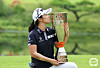 Kim Su-ji kisses the Hanwha Classic trophy after winning the tournament at Jade Palace Golf Club in Chuncheon, Gangwon, on Sunday. [KLPGA]