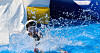 A child comes down a water slide at an outdoor pool at the Jamsil Hangang Park in Songpa District, southern Seoul, during the pool’s opening event held on Wednesday, one day prior to the official opening of six river park pools run by the Seoul Metropolitan Government. [YONHAP]
