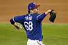 Texas Rangers relief pitcher Yang Hyeon-Jong throws to the Milwaukee Brewers in the sixth inning of a preseason baseball game in Arlington, Texas on Monday. [AP/YONHAP]