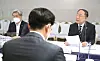 Finance Minister Hong Nam-ki, rigt, during a meeting on real estate at the government complex in Seoul on Wednesday. [YONHAP]