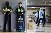 Armed police officers are stationed at Seohyeon Station in Seongnam, Gyeonggi, on Friday. [YONHAP]